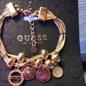Guess Gold and Pink Charm Bracelet